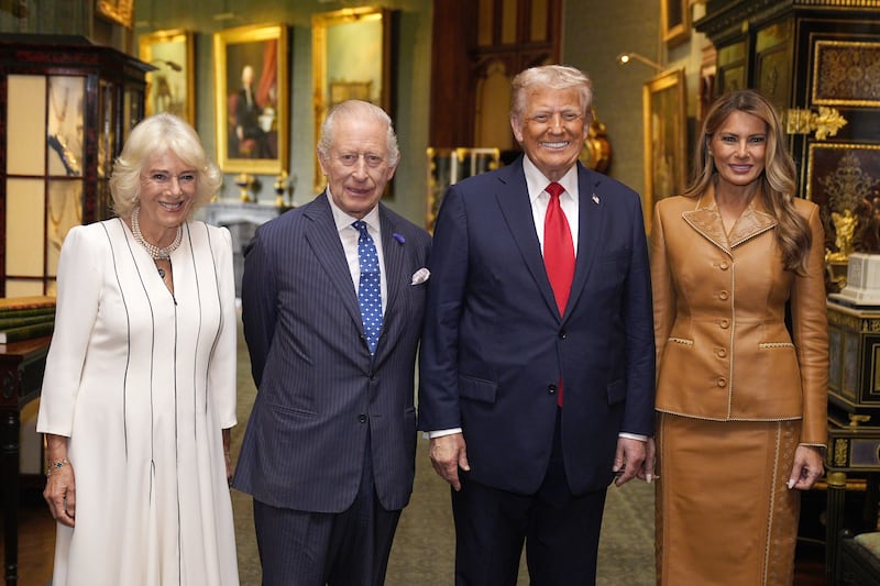 U.S. President Donald Trump and first lady Melania Trump pose with King Charles and Queen Camilla