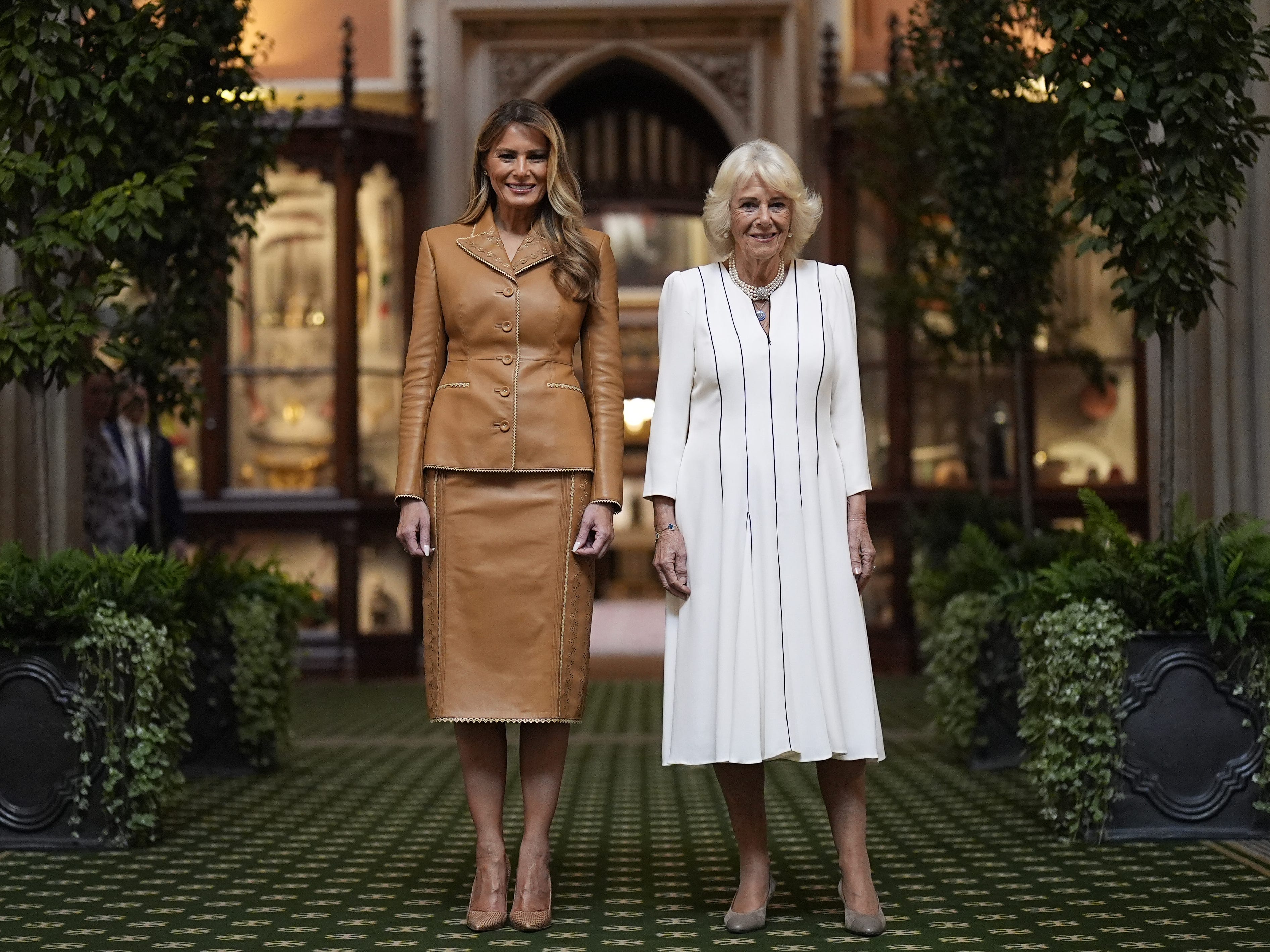 Queen Camilla and Melania Trump tour Queen Mary's Dolls' House and the Royal Library in September 2025 in Windsor, England.