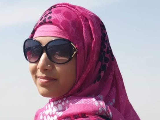 Ariba Mobin in a pink scarf and sunglasses