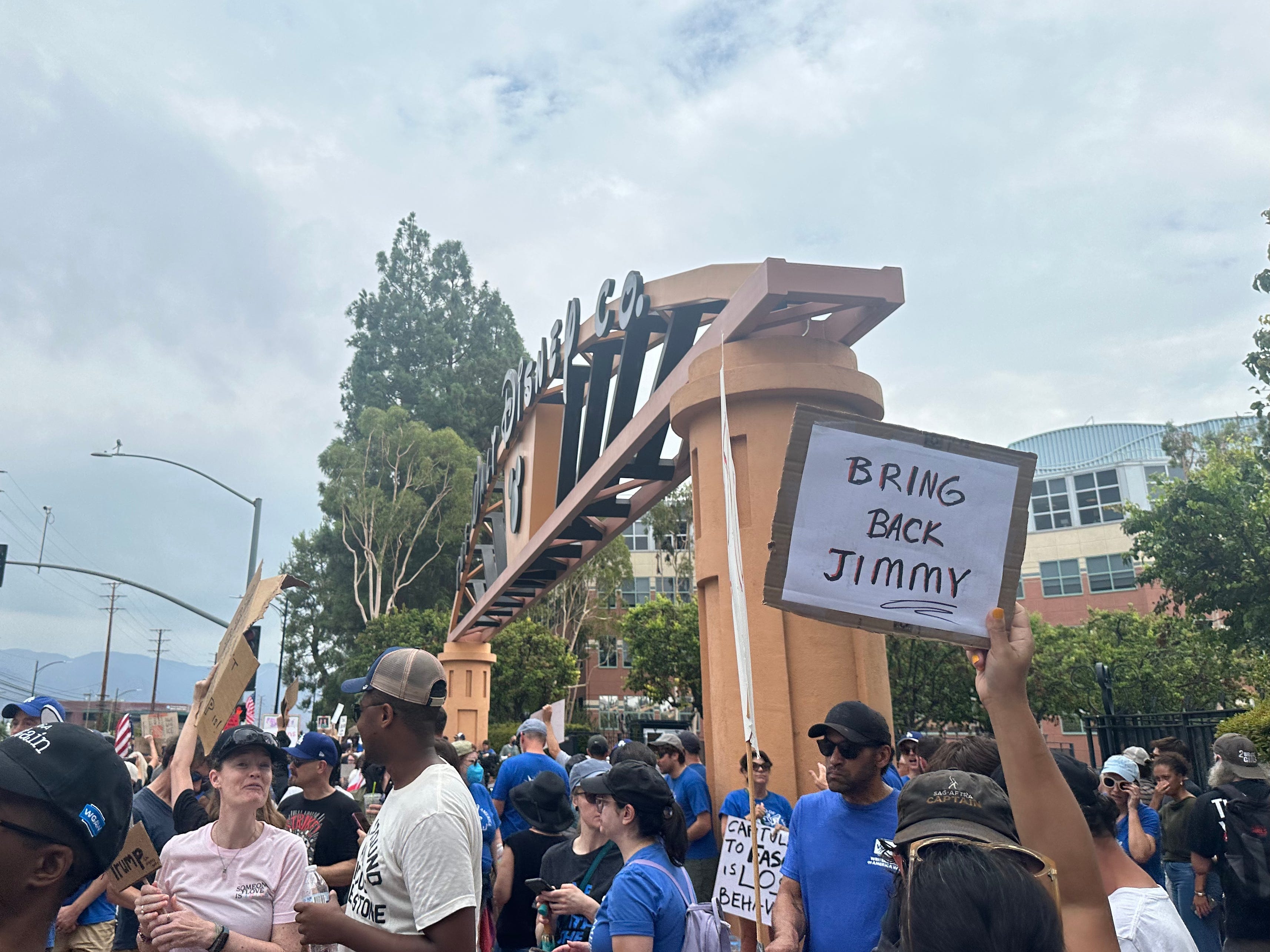 Protester with sign that reads 