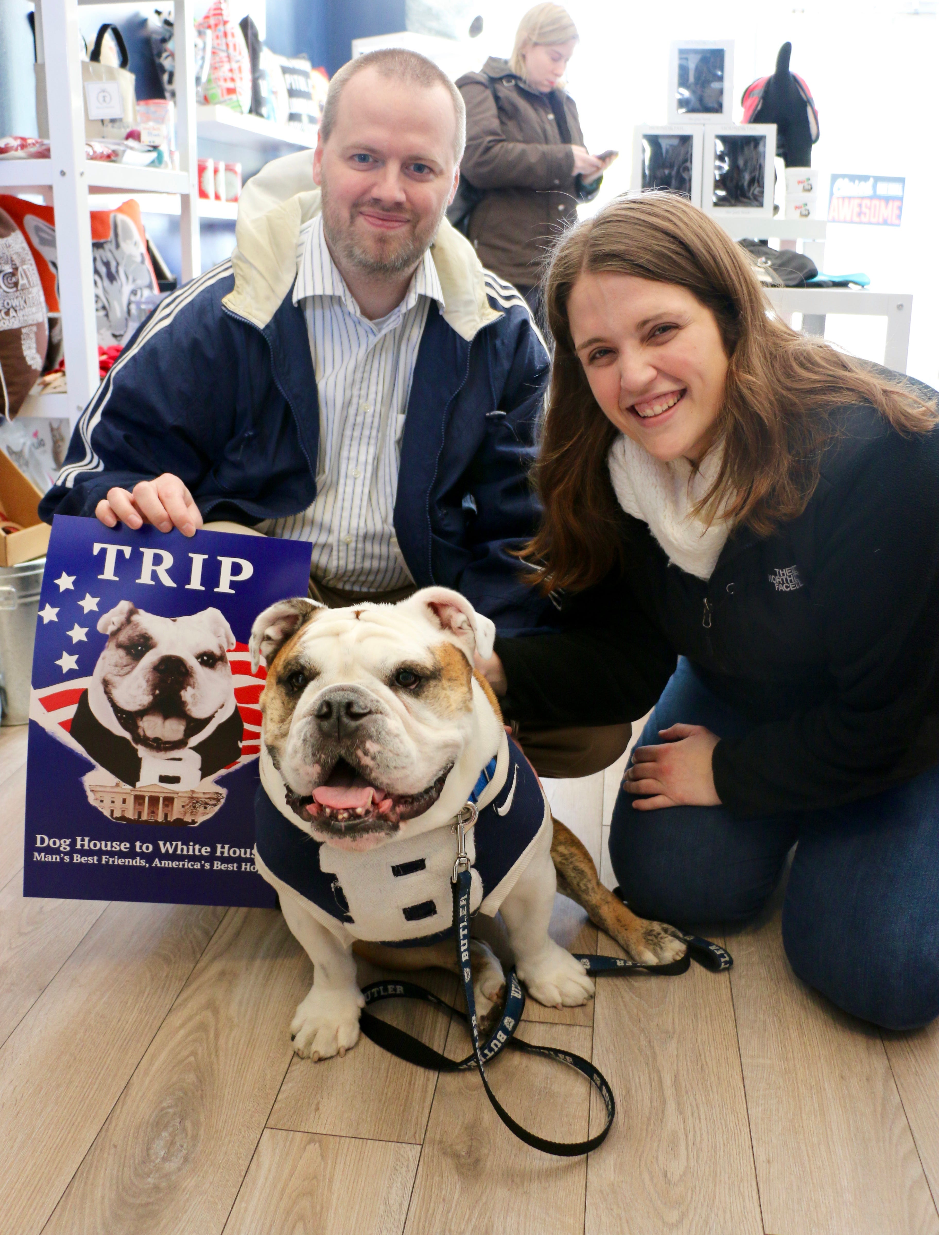The author and her husband, her husband, Brad, with Trip, Butler University's mascot, when she covered his appearance in the area.