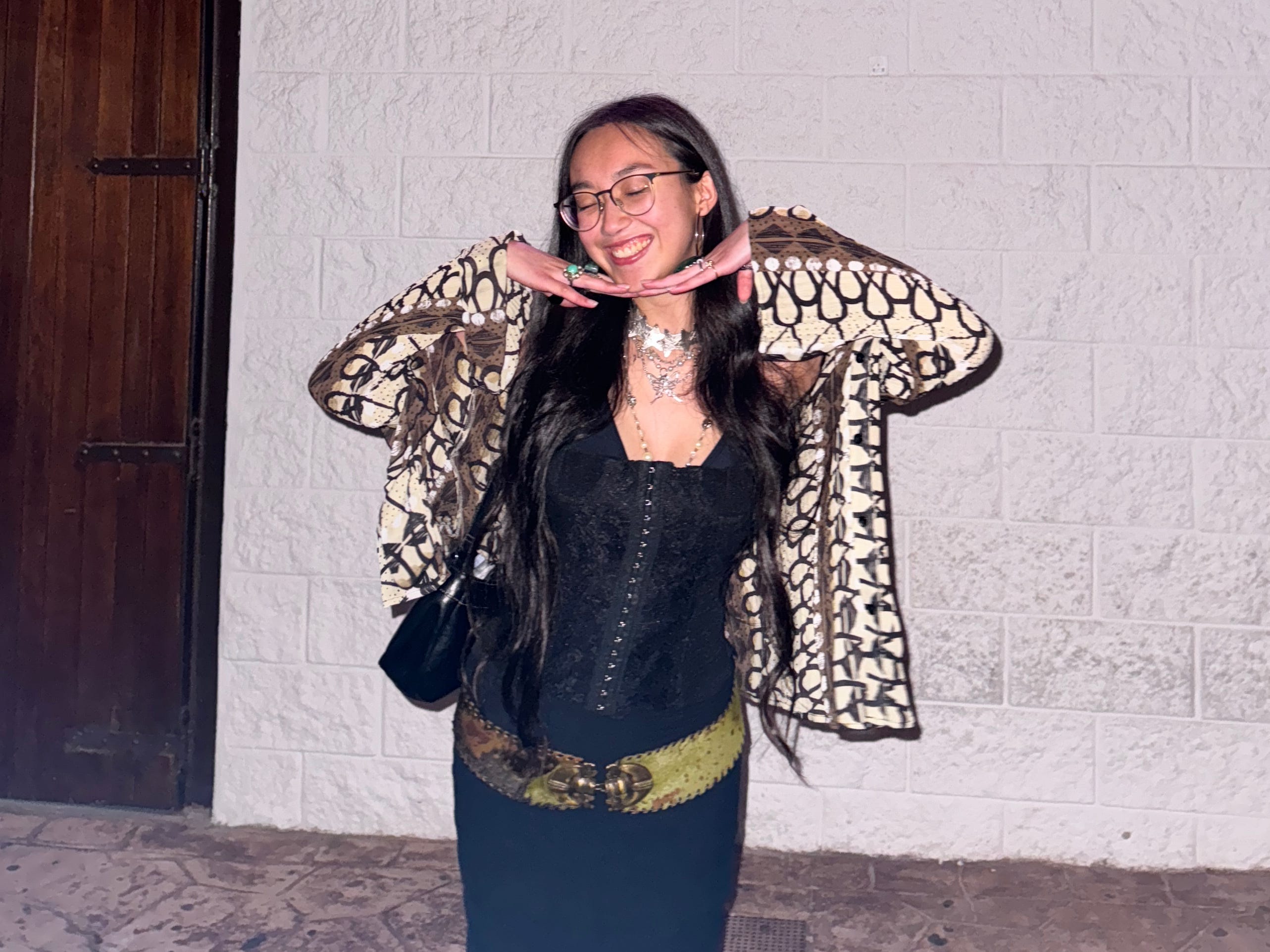 The author posing outside the venue.
