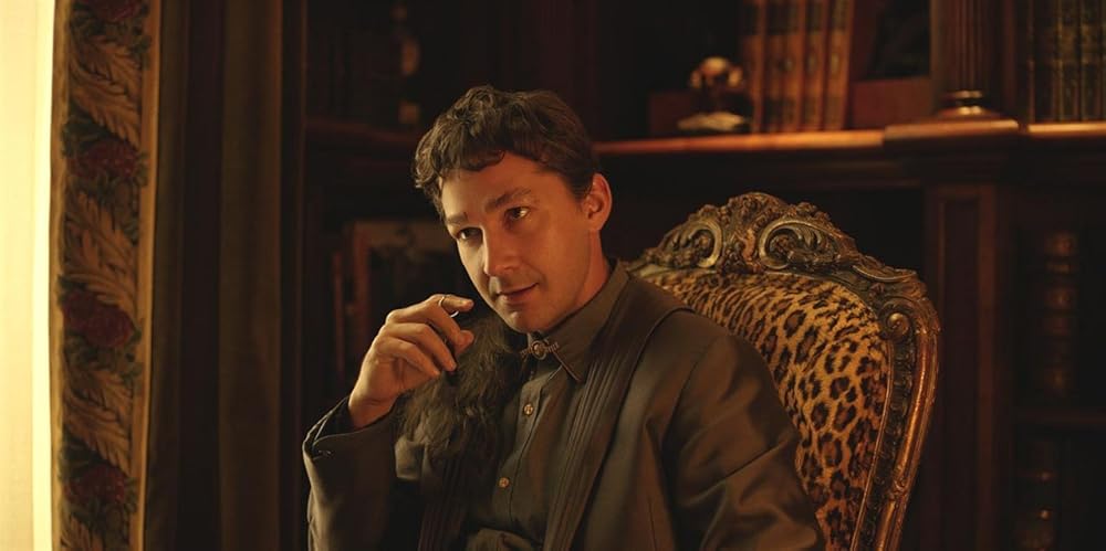 Shia LaBeouf sitting on a chair