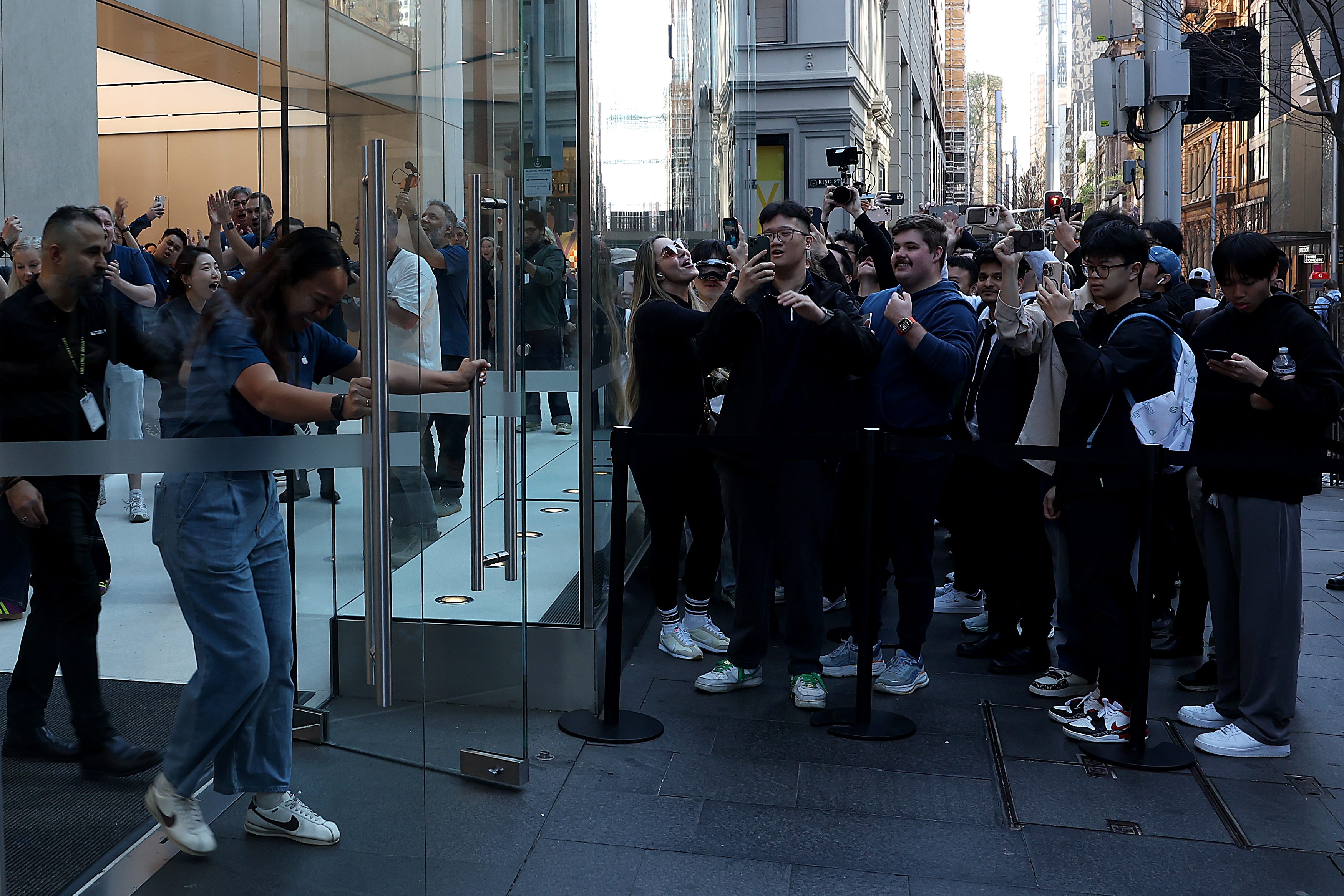Apple store employees open up the Sydney location