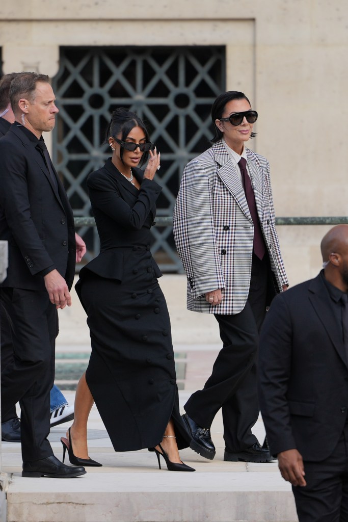 Kim Kardashian and Kris Jenner exit the trial at the Palais de Justice