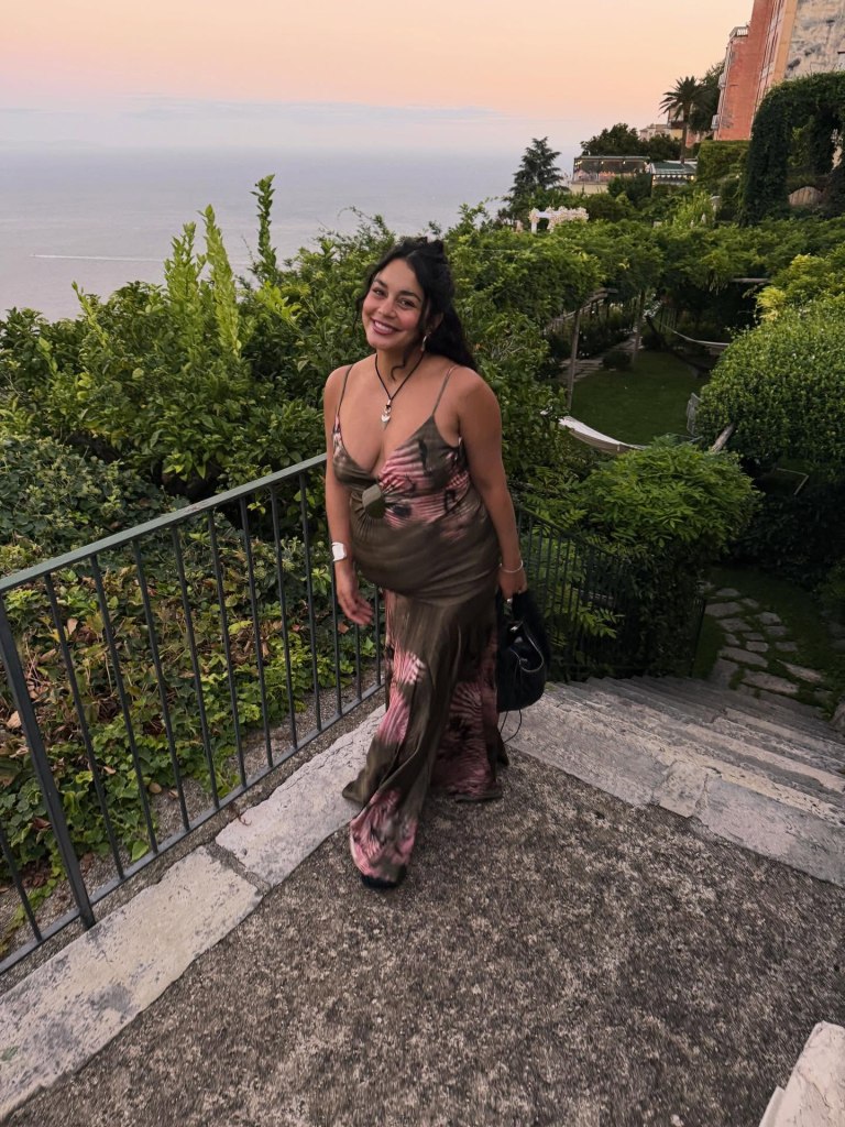 Vanessa Hudgens shows off her baby bump on vacation.