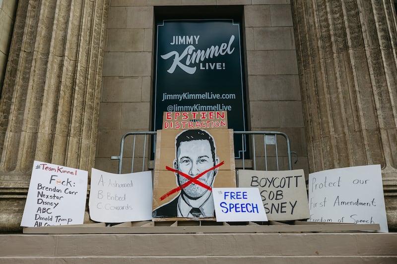 Protest signs outside El Capitan Theatre