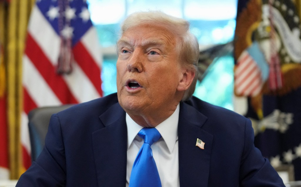 U.S. President Donald Trump speaking in the Oval Office.
