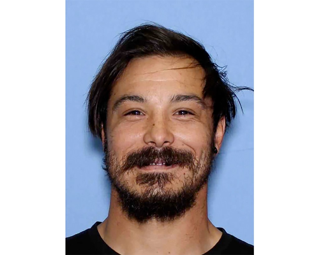 Travis Caleb Decker, wanted in connection with the deaths of his three daughters.