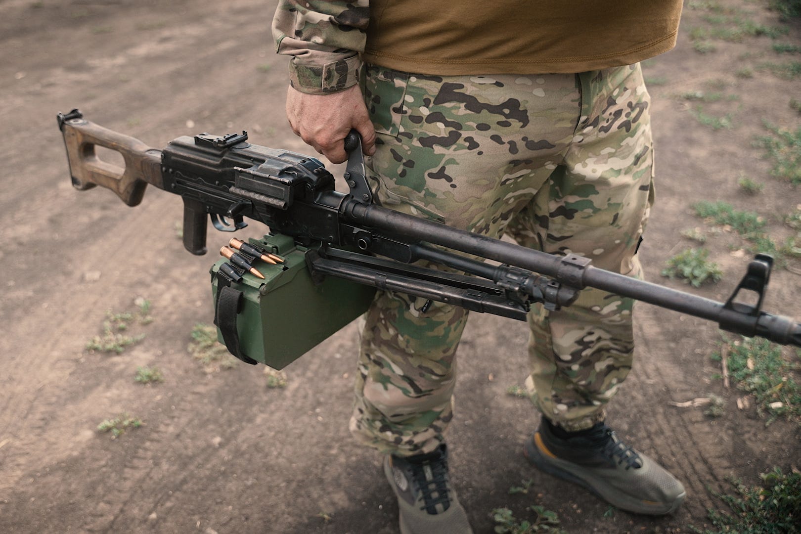 Vladyka holds a Russian PKM 7.62 mm machine gun.