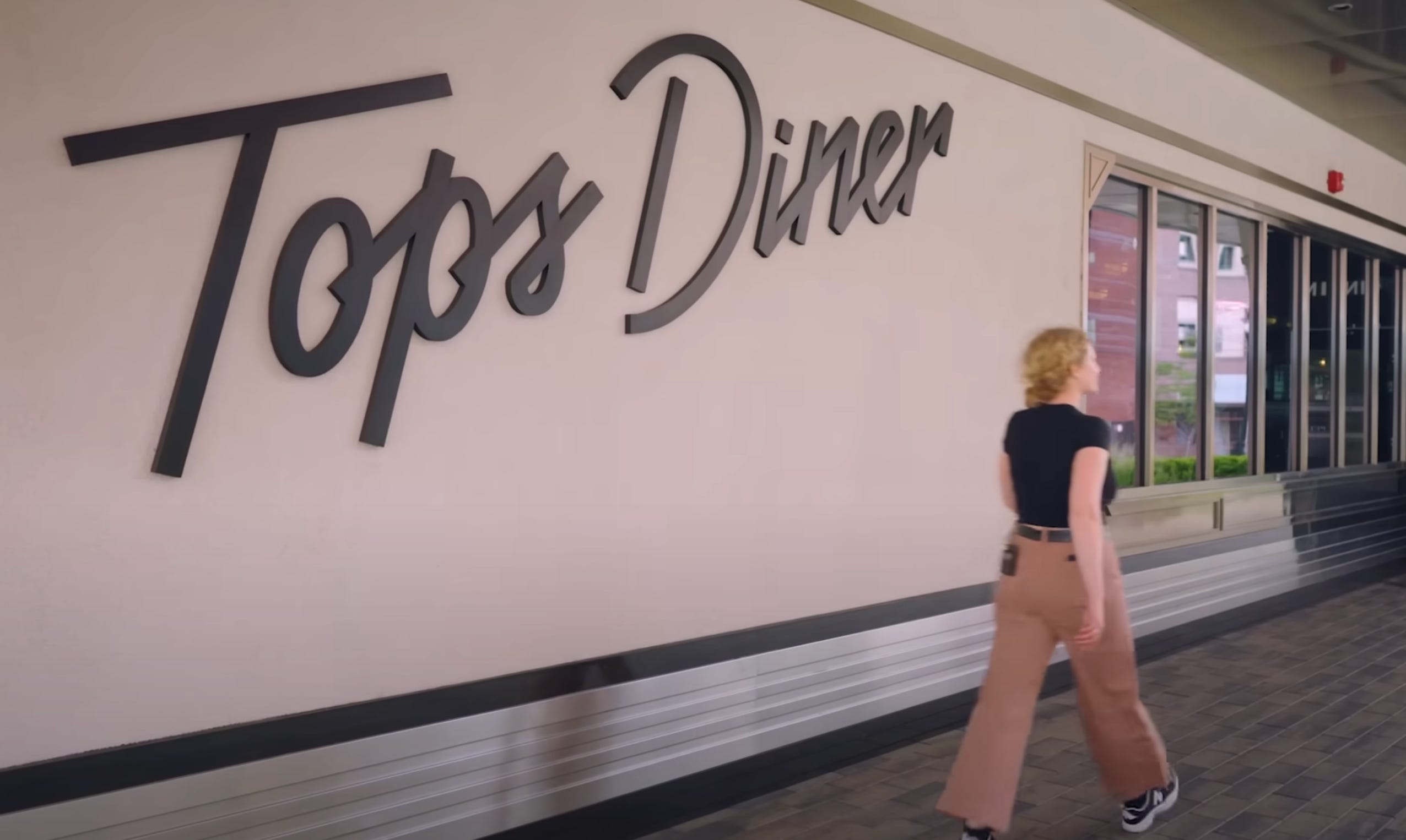 Abby Narishkin in front of Tops Diner