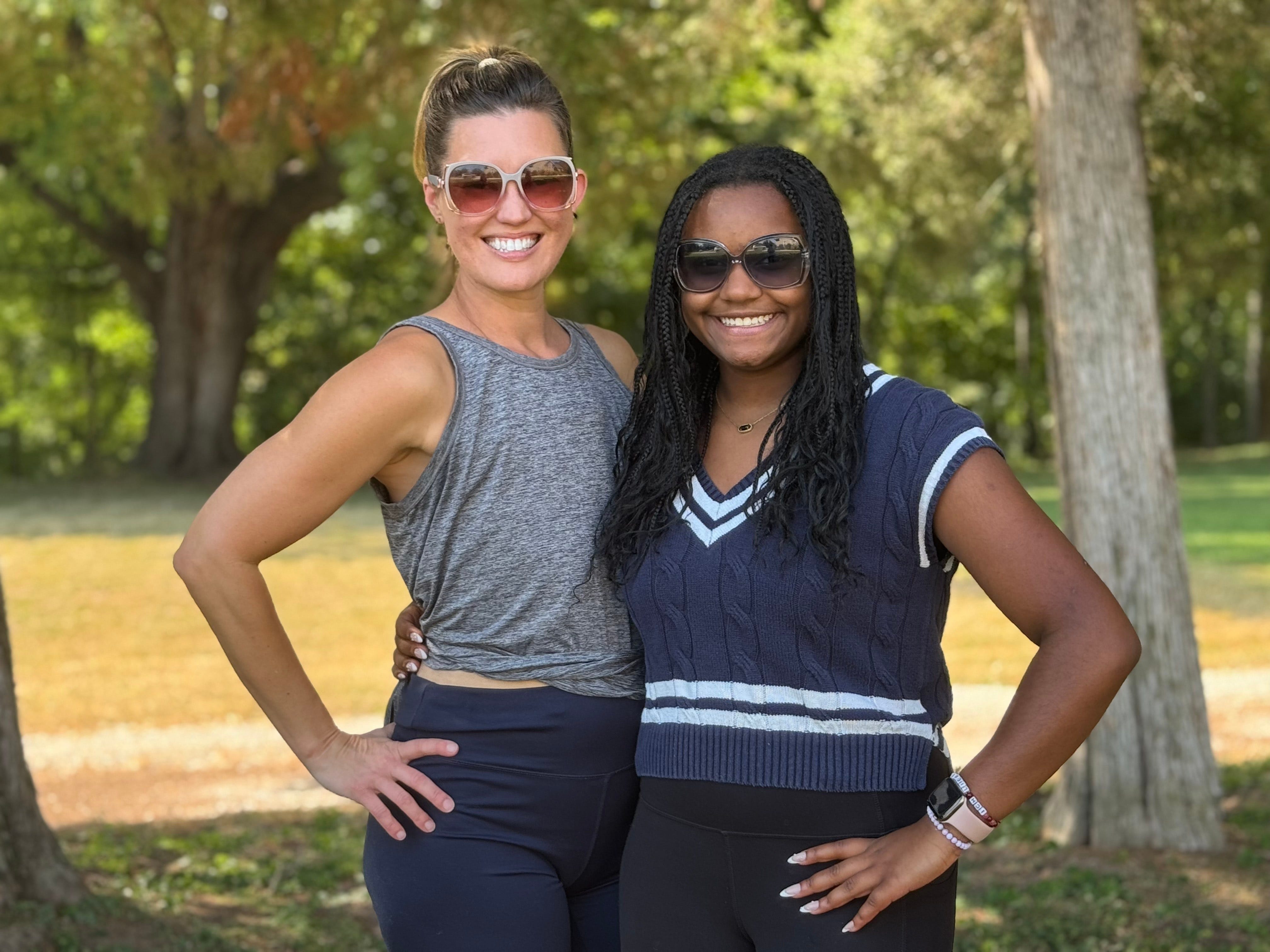 The author and her daughter pose in a park.