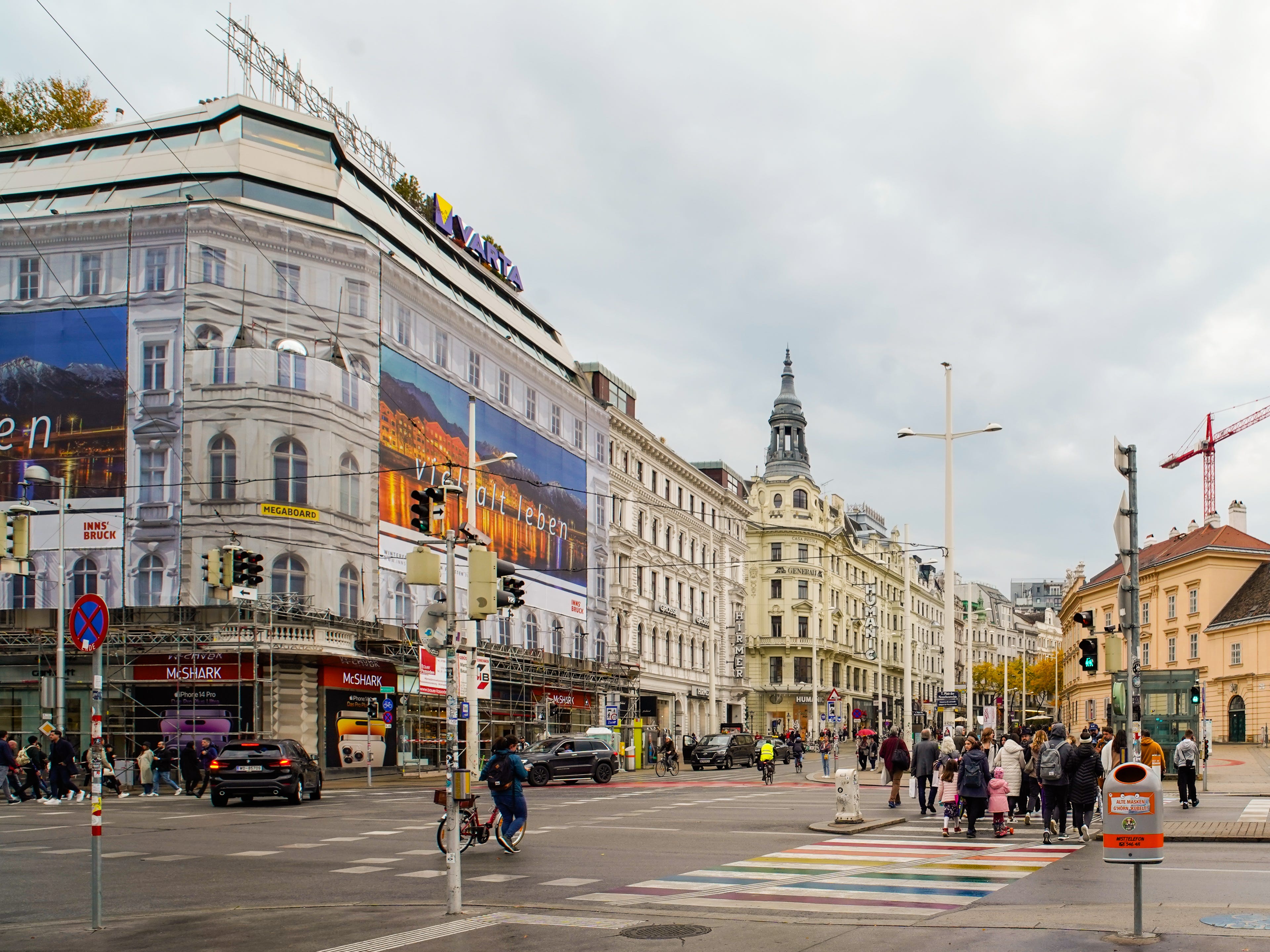 A busy street in Vienna on a cloudy day