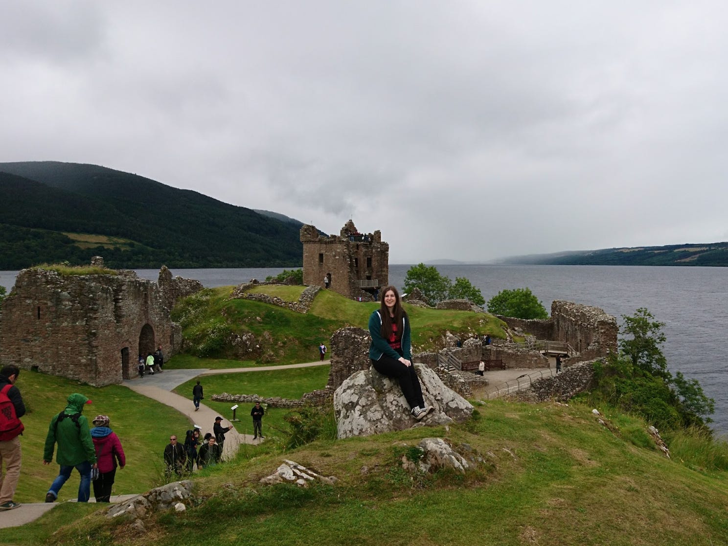 The writer posing in front of Urquhart Castle in Scotland.