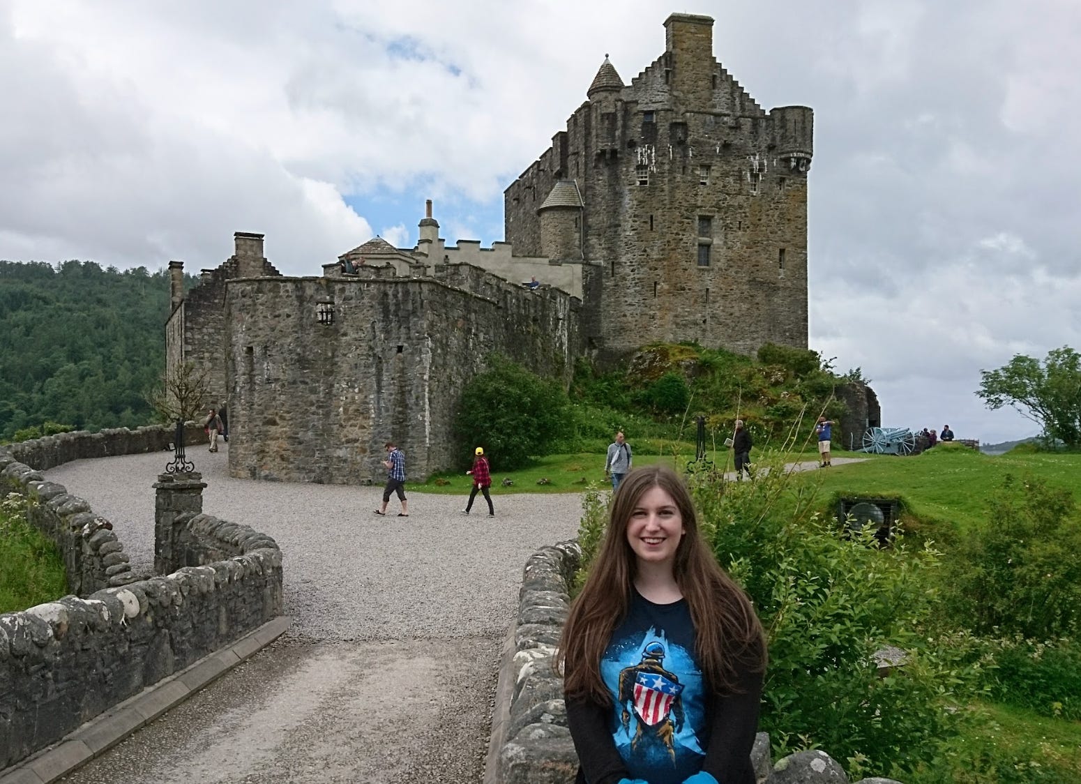 The writer in front of Eilean Donan Castle in Scotland.