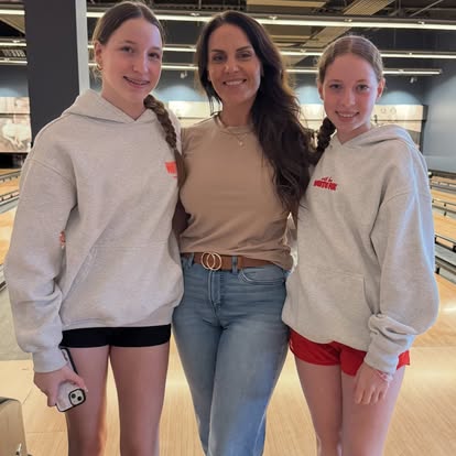 Girls posing with woman