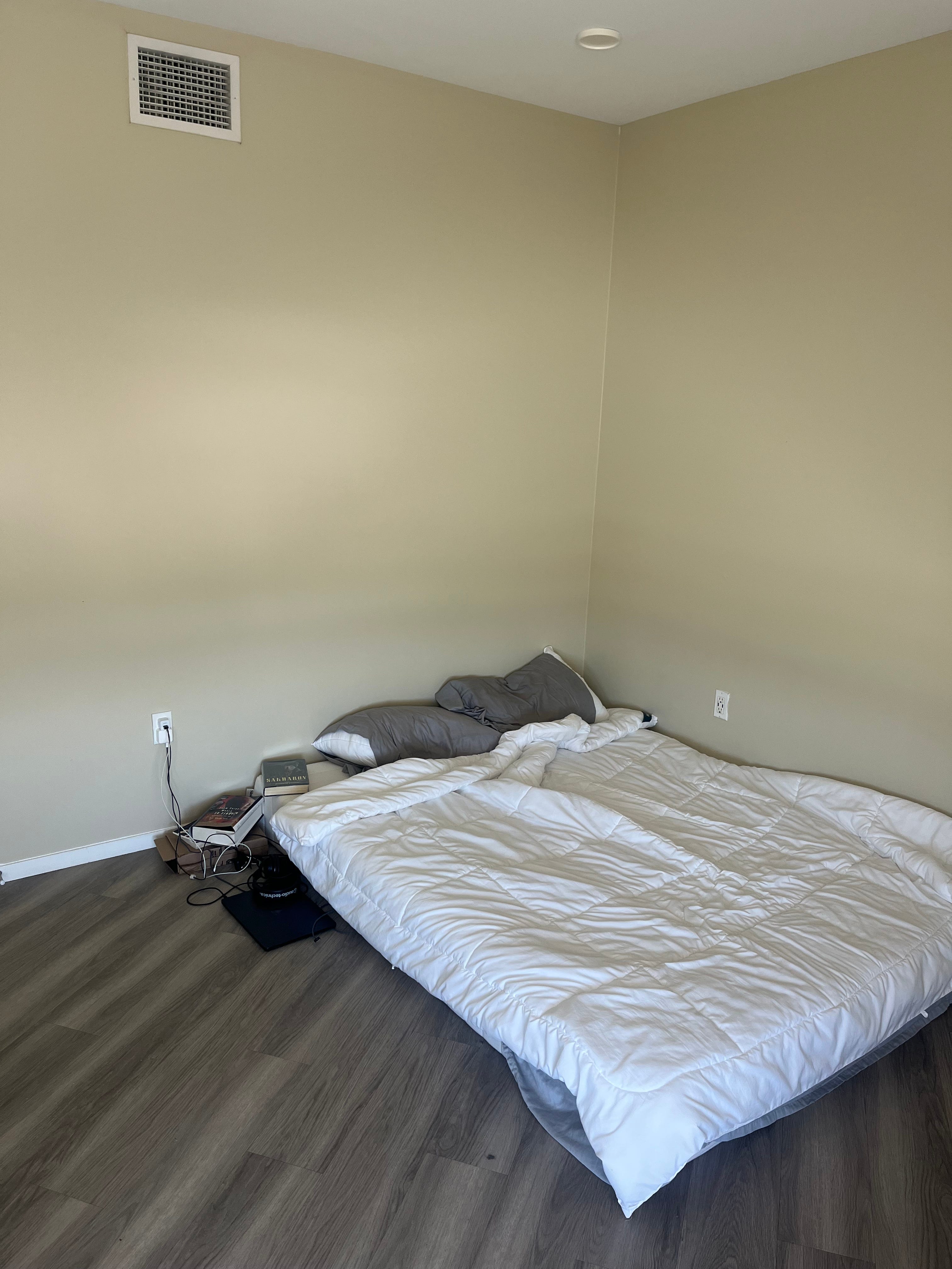 Boris Skurikhin's bed and makeshift nightstand are pictured.