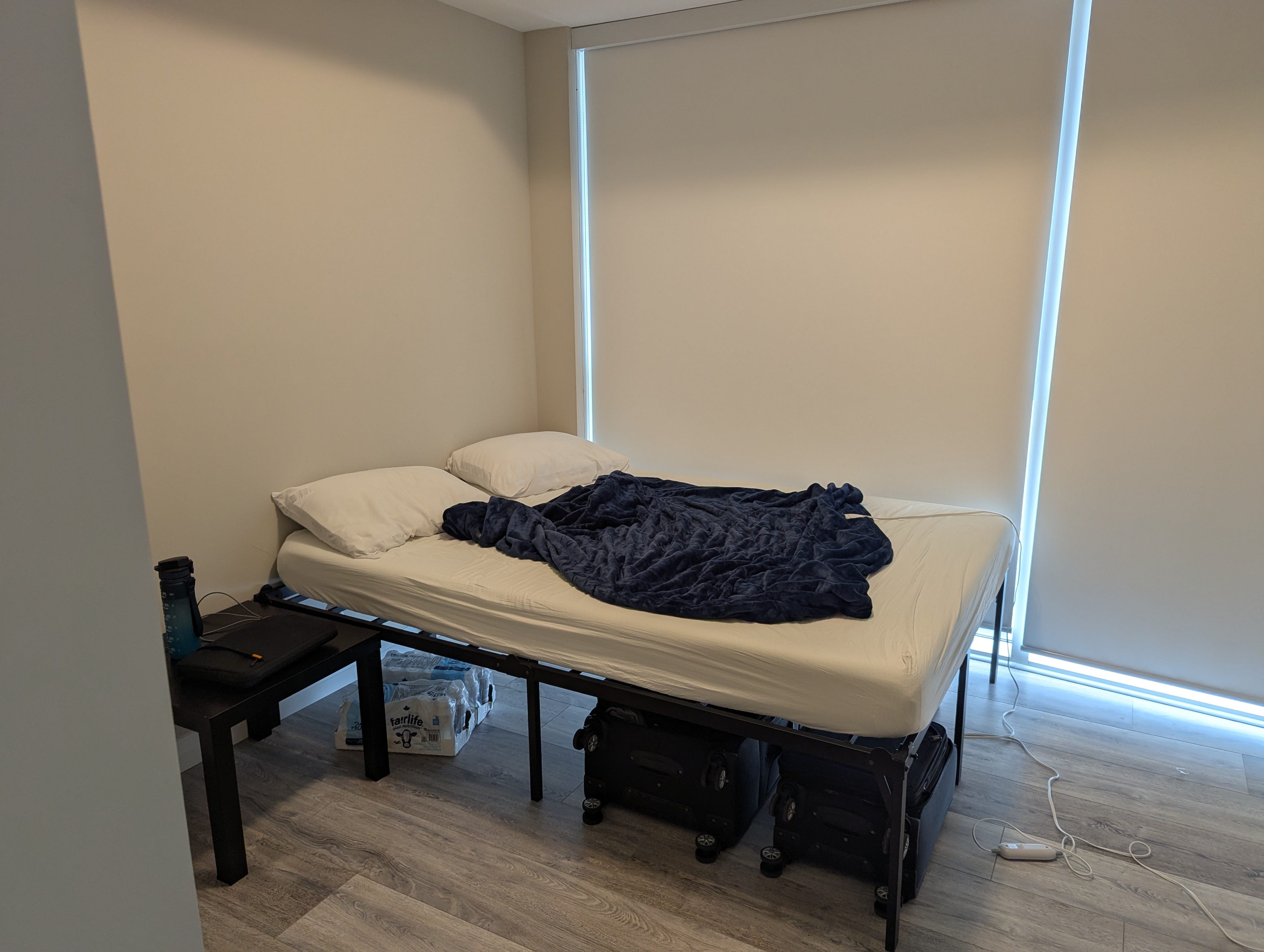 Haokun Qin's bed is pictured.
