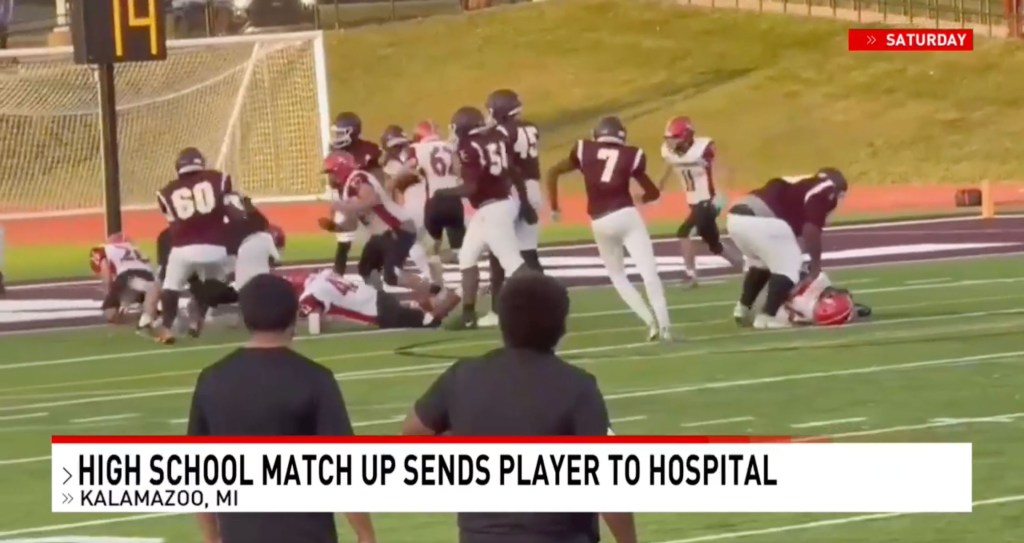 Footage from a high school football game where a player was injured.