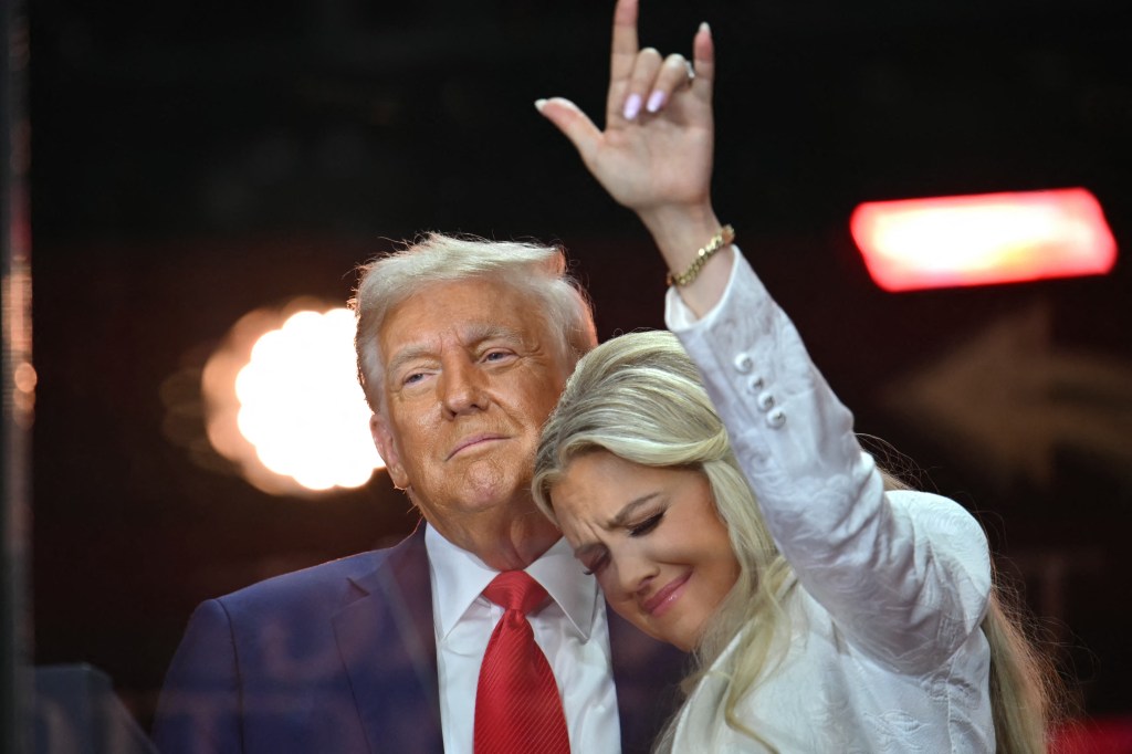 Donald Trump with Erika Kirk, widow of Charlie Kirk, at a memorial service.