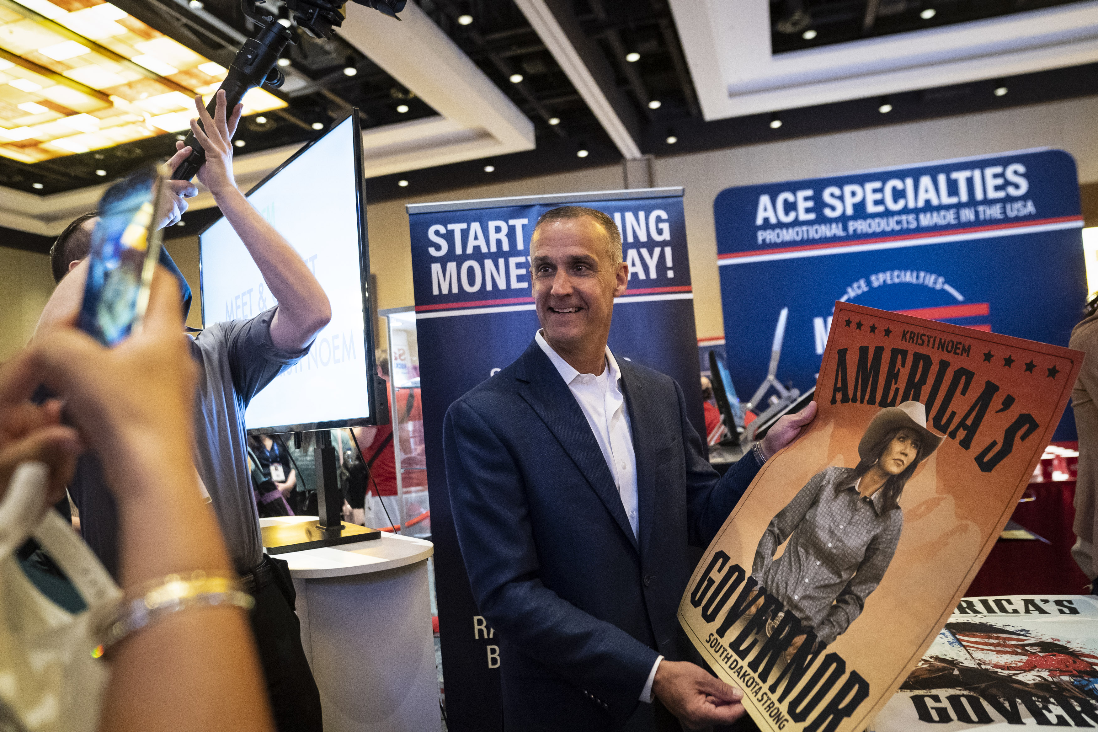 Corey R. Lewandowski holds a poster for South Dakota Gov. Kristi Noem during the Conservative Political Action Conference CPAC held at the Hyatt Regency Orlando on Saturday, Feb 27, 2021 in Orlando, FL.