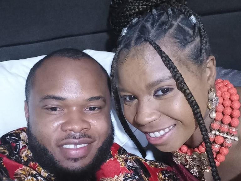 A man and women in traditional Nigerian adress