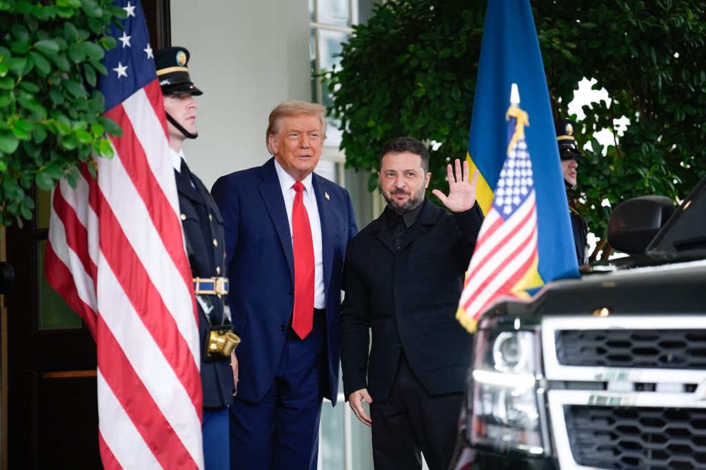 Donald Trump greets Ukrainian President Volodymyr Zelenskyy at the White House.