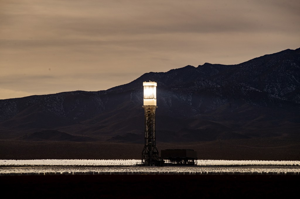 Beams of sunlight are reflected toward one of the solar towers of the Ivanpah solar plant near Primm at the Nevada-California border.