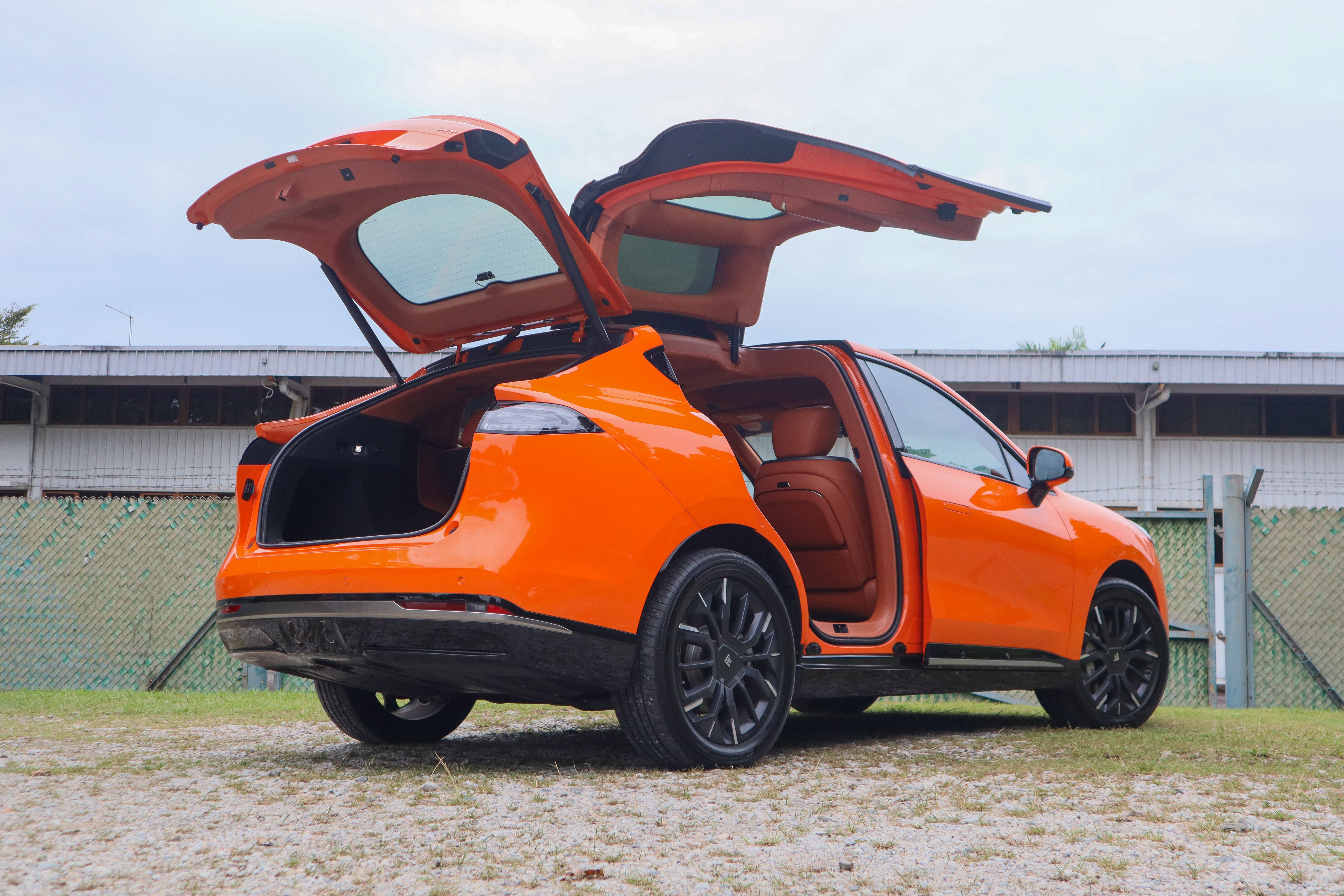 The Hyptec HT's gullwing rear doors open.
