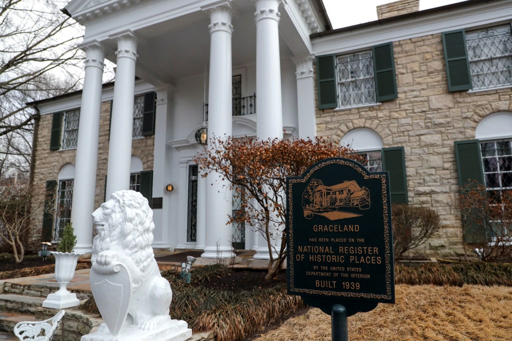 Graceland Mansion, built in 1939, with a sign indicating its place on the National Register of Historic Places.