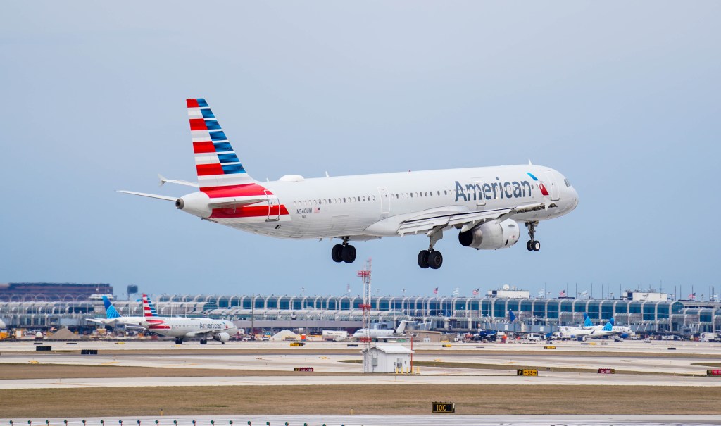 American Airlines plane landing at an airport.