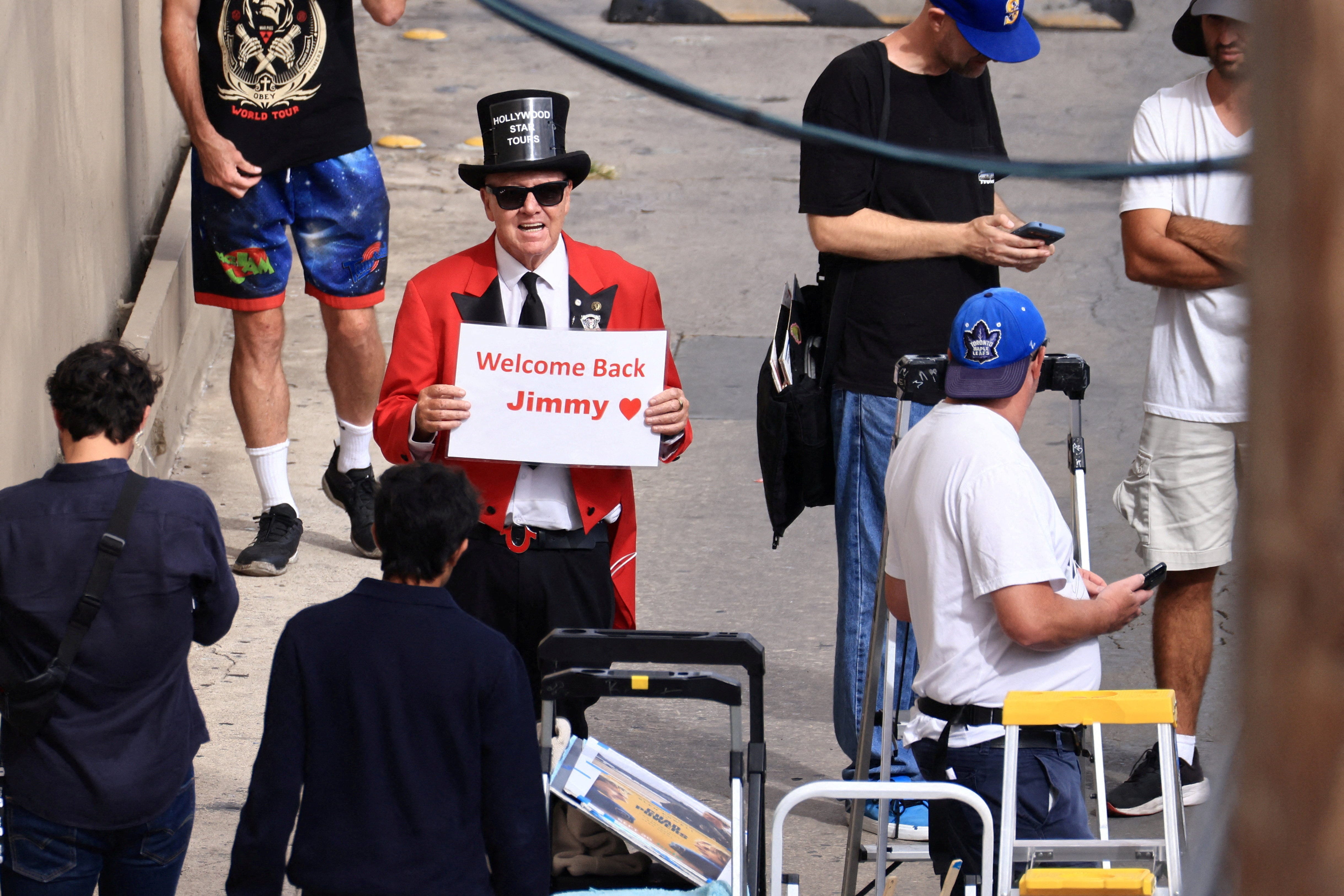 Man with sign that says 