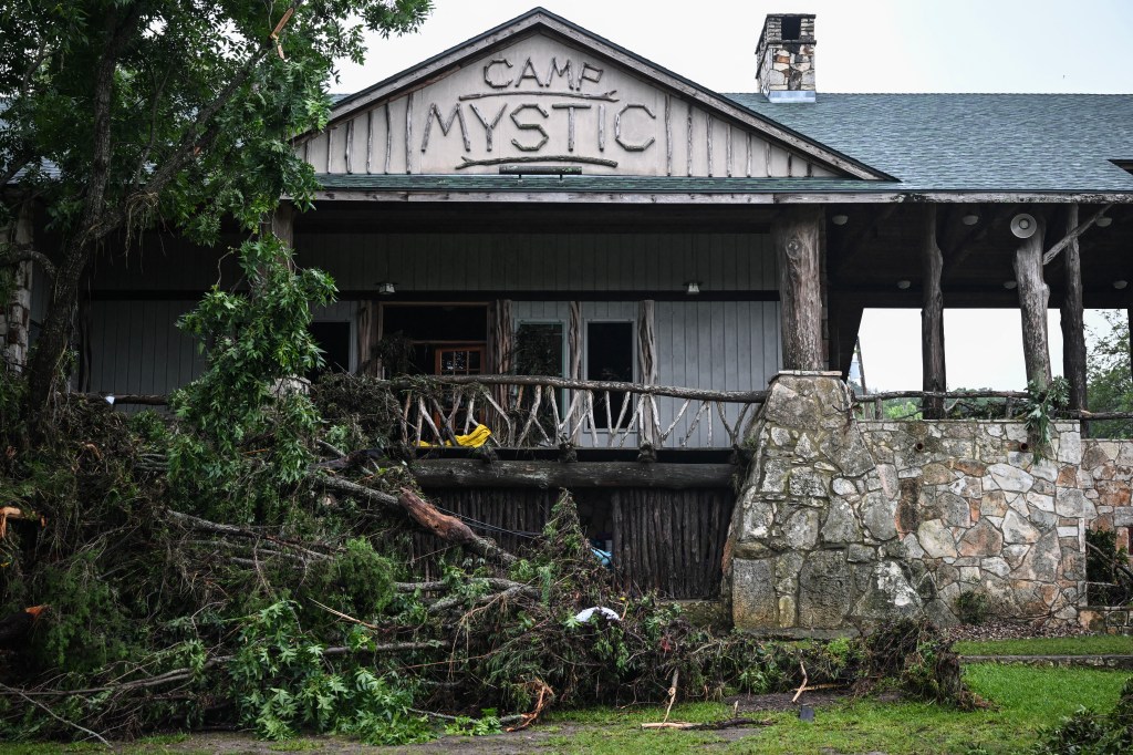 The front of Camp Mystic, showing a porch with debris from flash flooding.