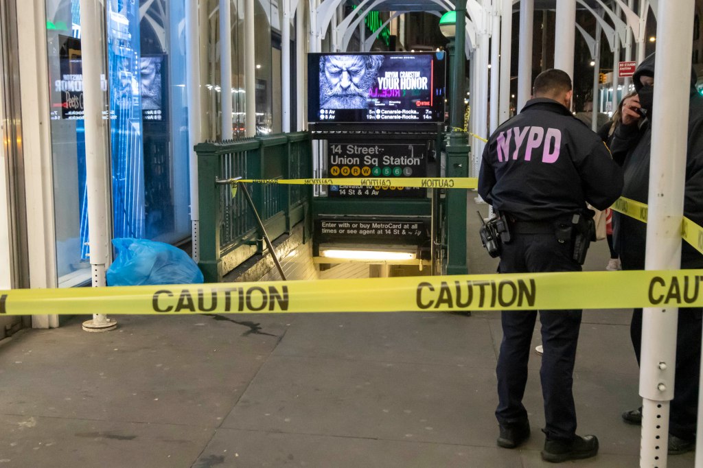 NYPD officer at the scene of a stabbing in the stairwell of the Union Square subway station in Manhattan.