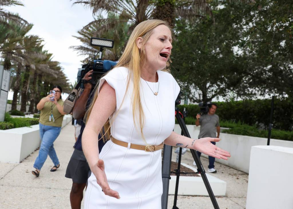 Sara Routh runs from the Alto Lee Adams, Sr. U.S. Courthouse in Fort Pierce after a jury on Sept. 23, 2025, found her father guilty of plotting to assassinate Donald Trump