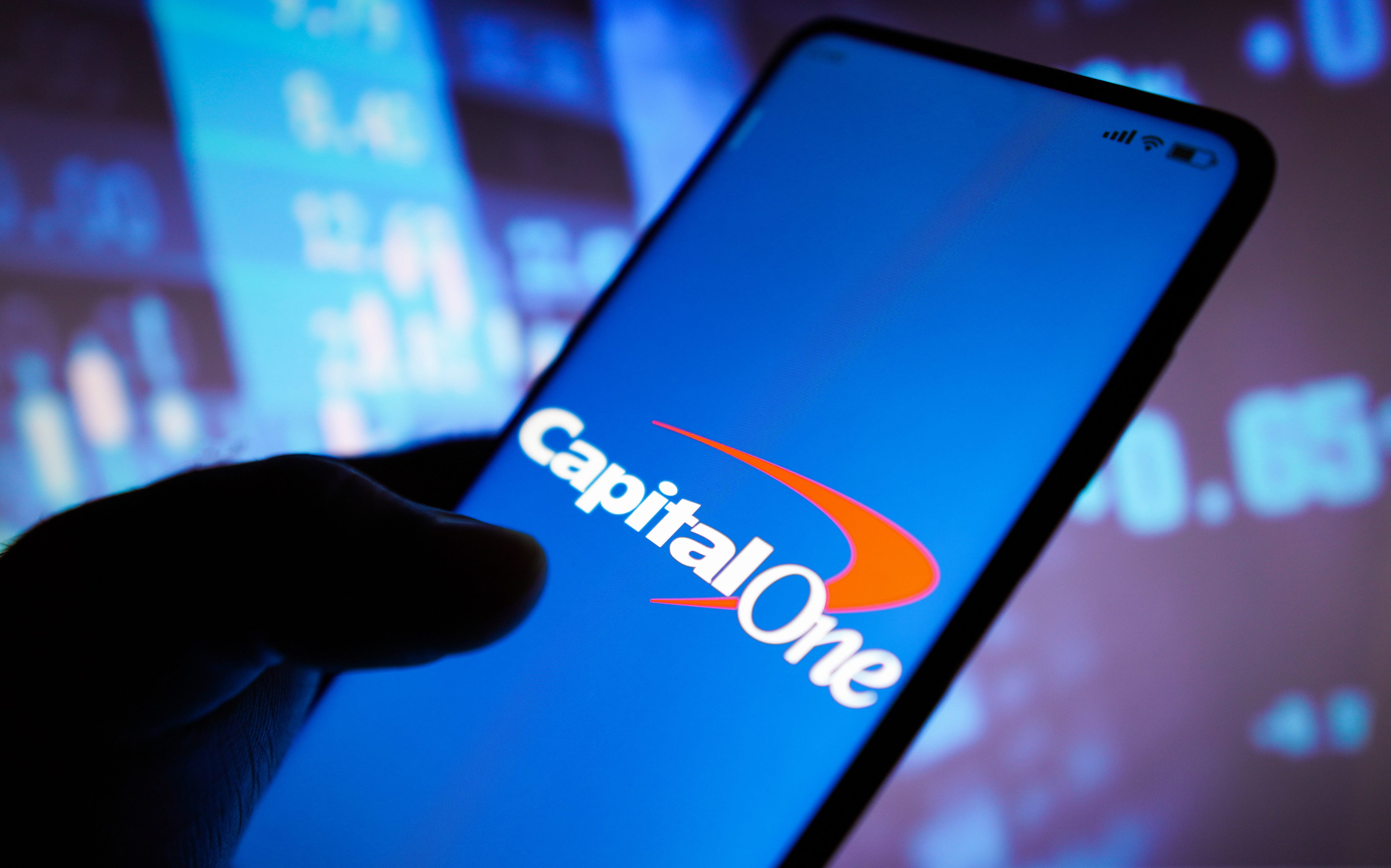 In this photo illustration, the Capital One Financial Corp. logo displayed on a smartphone.