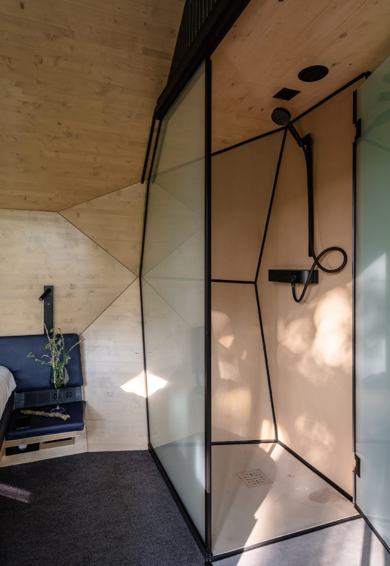 The shower of the Pebl Grand tiny home.