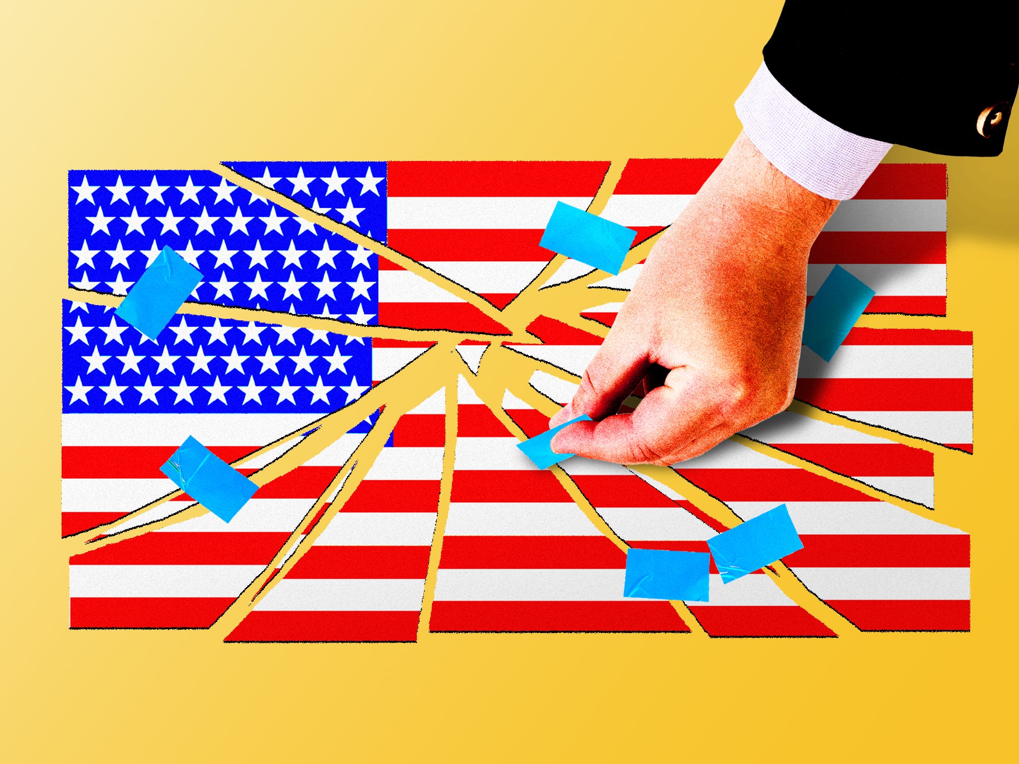A business man's hand taping up the American flag