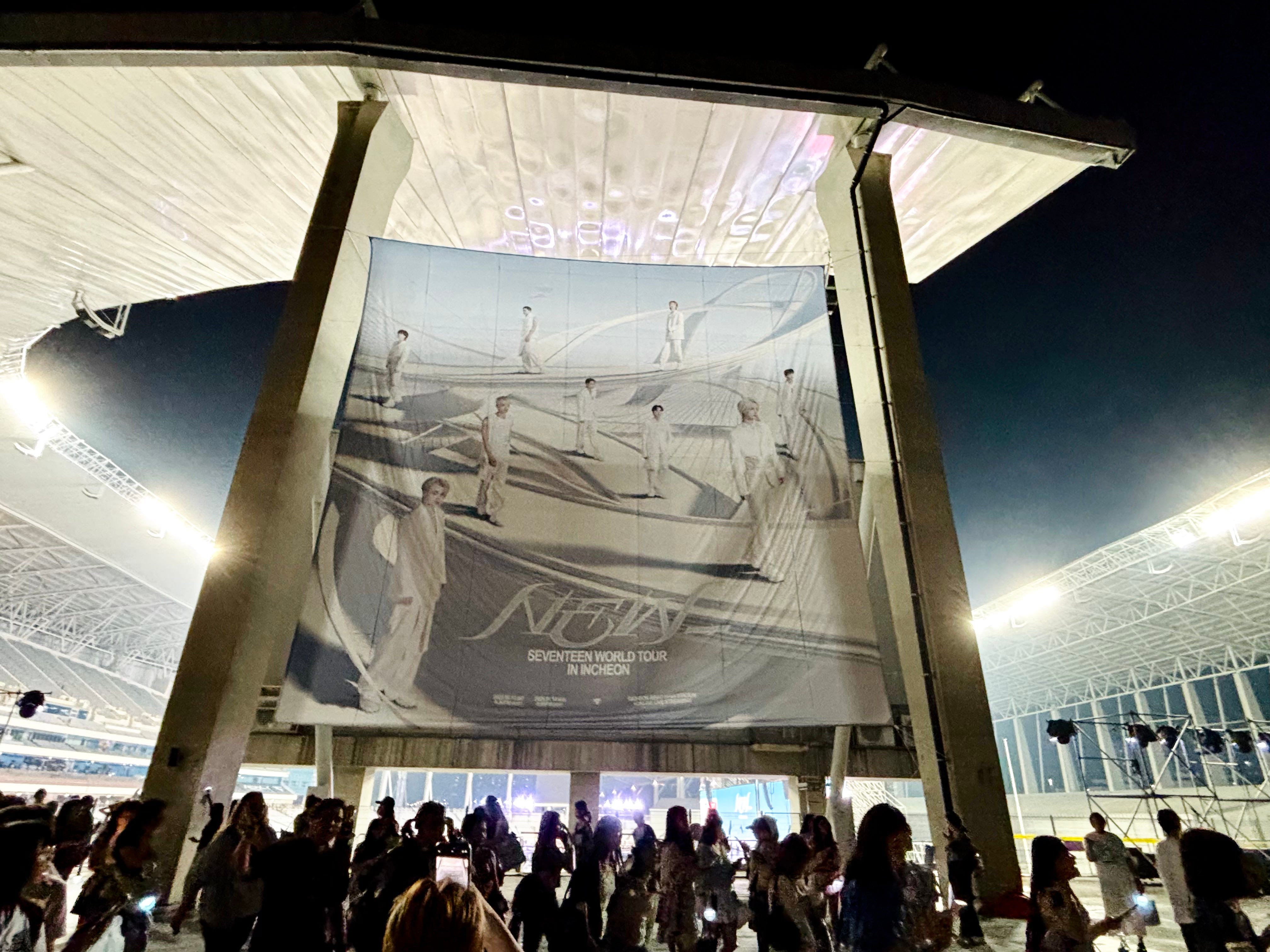 The view of a massive Seventeen tour poster at the Incheon Asiad Main Stadium.
