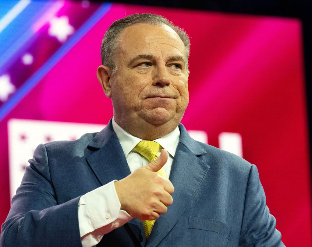 Chris Ruddy, CEO of Newsmax, giving a thumbs-up at the 2023 Conservative Political Action Conference (CPAC) in National Harbor, Maryland.