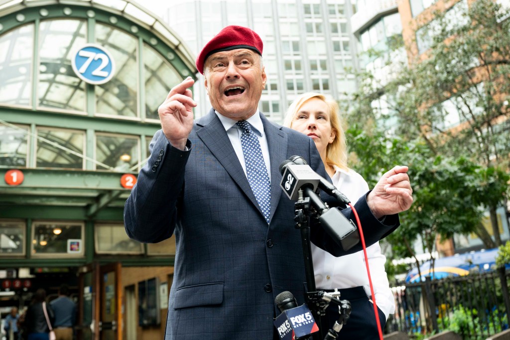 Curtis Sliwa speaking at a press conference outside the West 72nd Street subway station in New York City.