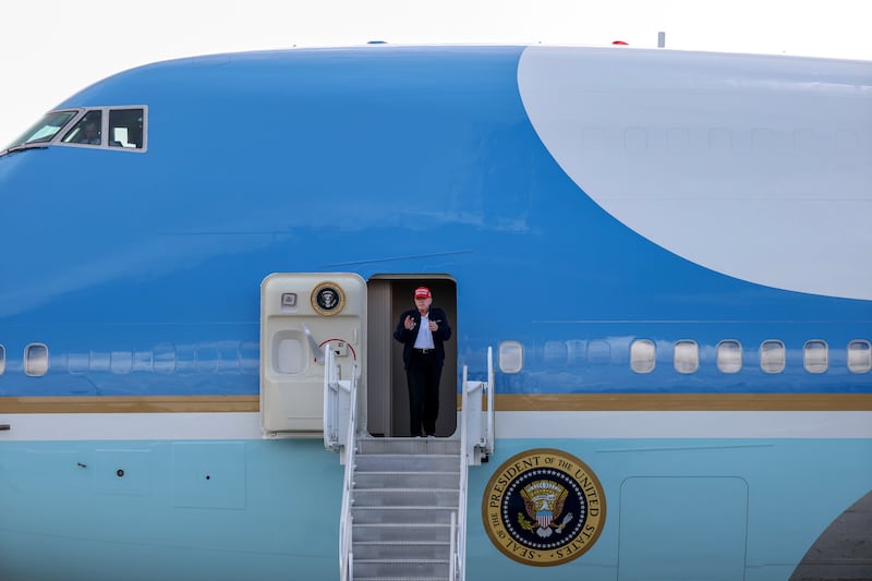 MIAMI, FLORIDA - FEBRUARY 19: U.S. President Donald Trump departs Air Force One at Miami International Airport on February 19, 2025 in Miami, Florida. President Trump is scheduled to attend a meeting of global financiers and tech executives hosted by Saudi Arabia’s sovereign wealth fund in Miami.  (Photo by Joe Raedle/Getty Images)