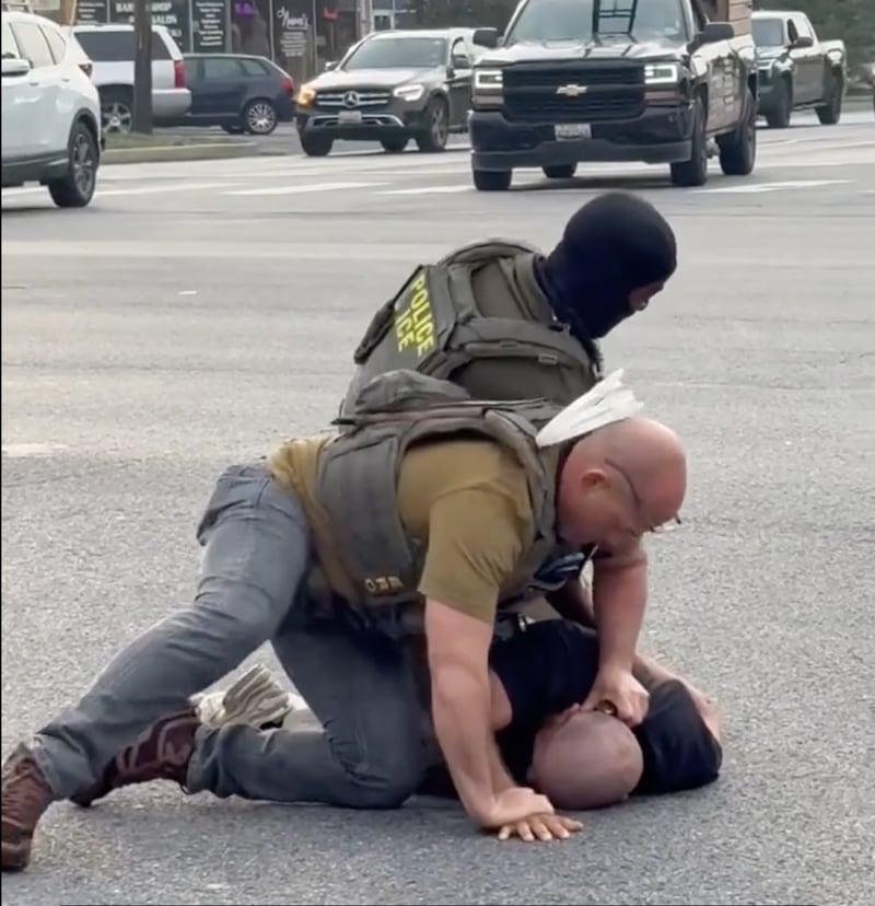 The detainee resisted arrest for nearly 10 minutes before being placed in a unmarked minivan.