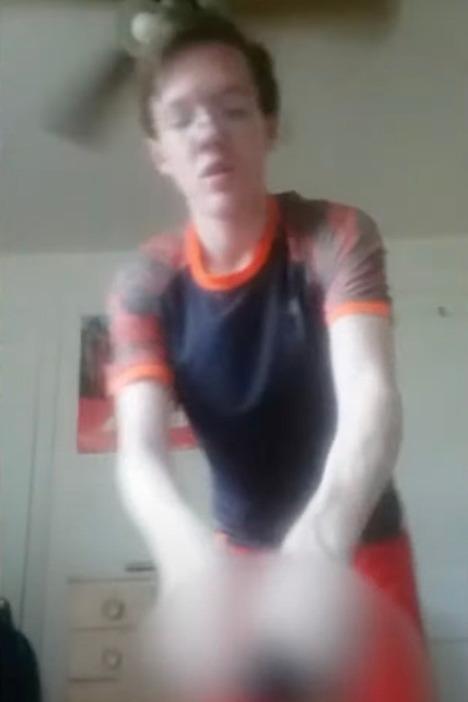 Thomas Crooks playing with a gun in a bedroom.