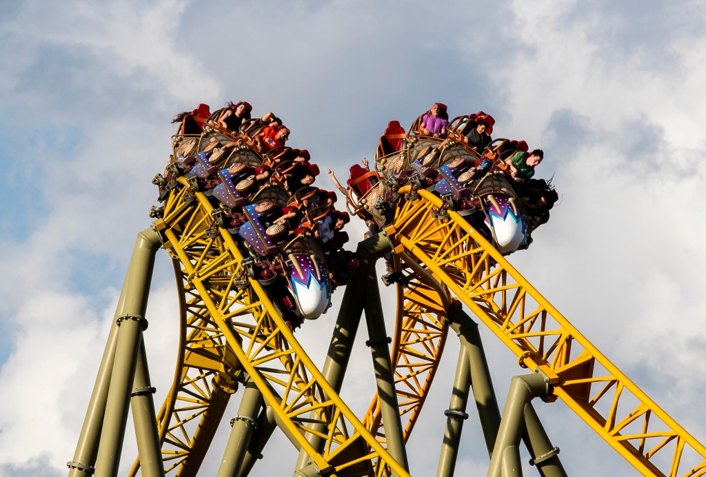 Guests riding Stardust Racers, a dueling roller coaster ride in Celestial Park, during a preview day for Universal Epic Universe.