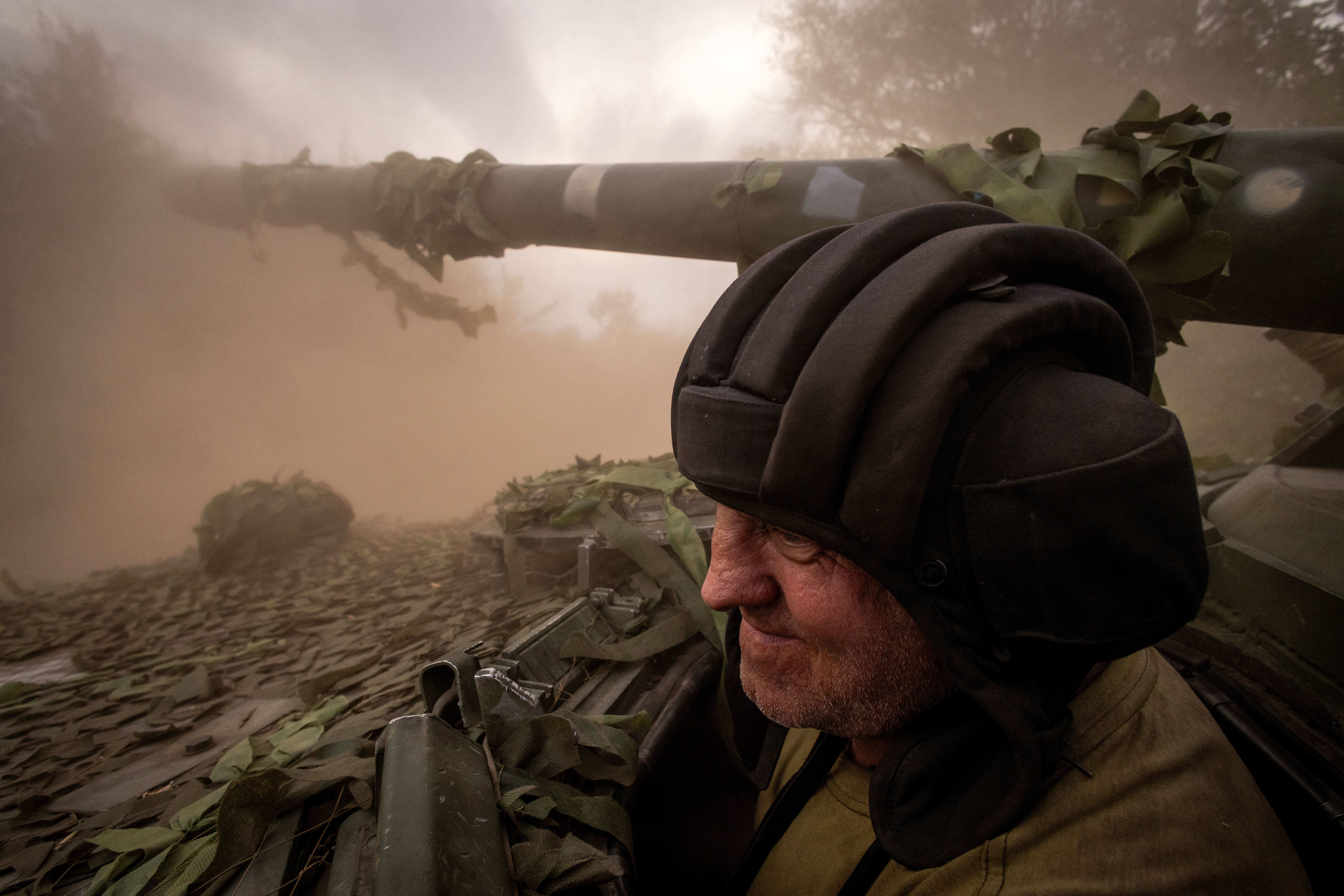 A Ukrainian soldier drives a BMP-3 during training.