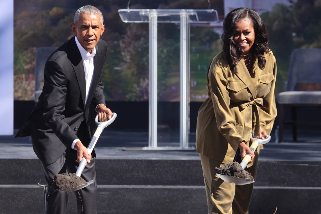 Former U.S. President Barack Obama and former first lady Michelle Obama participate in a ceremonial groundbreaking.