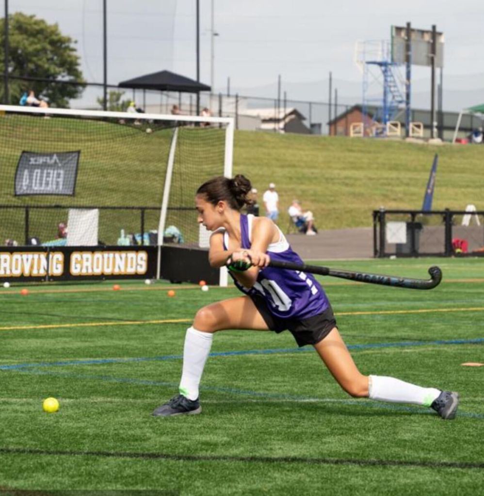 Olivia Goncalves teaches field hockey during her Girl Scout Silver Star project.