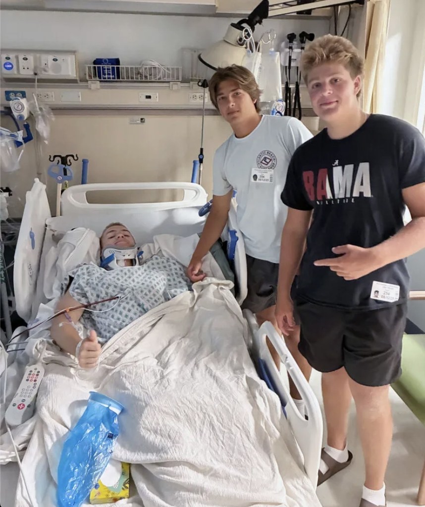Friends Kevin Bonino (center) and Jake Geller (right), who helped save Connor Dubeau's life after he suffered a near-death experience when he fell under the waters of Gilgo Beach and broke his neck.