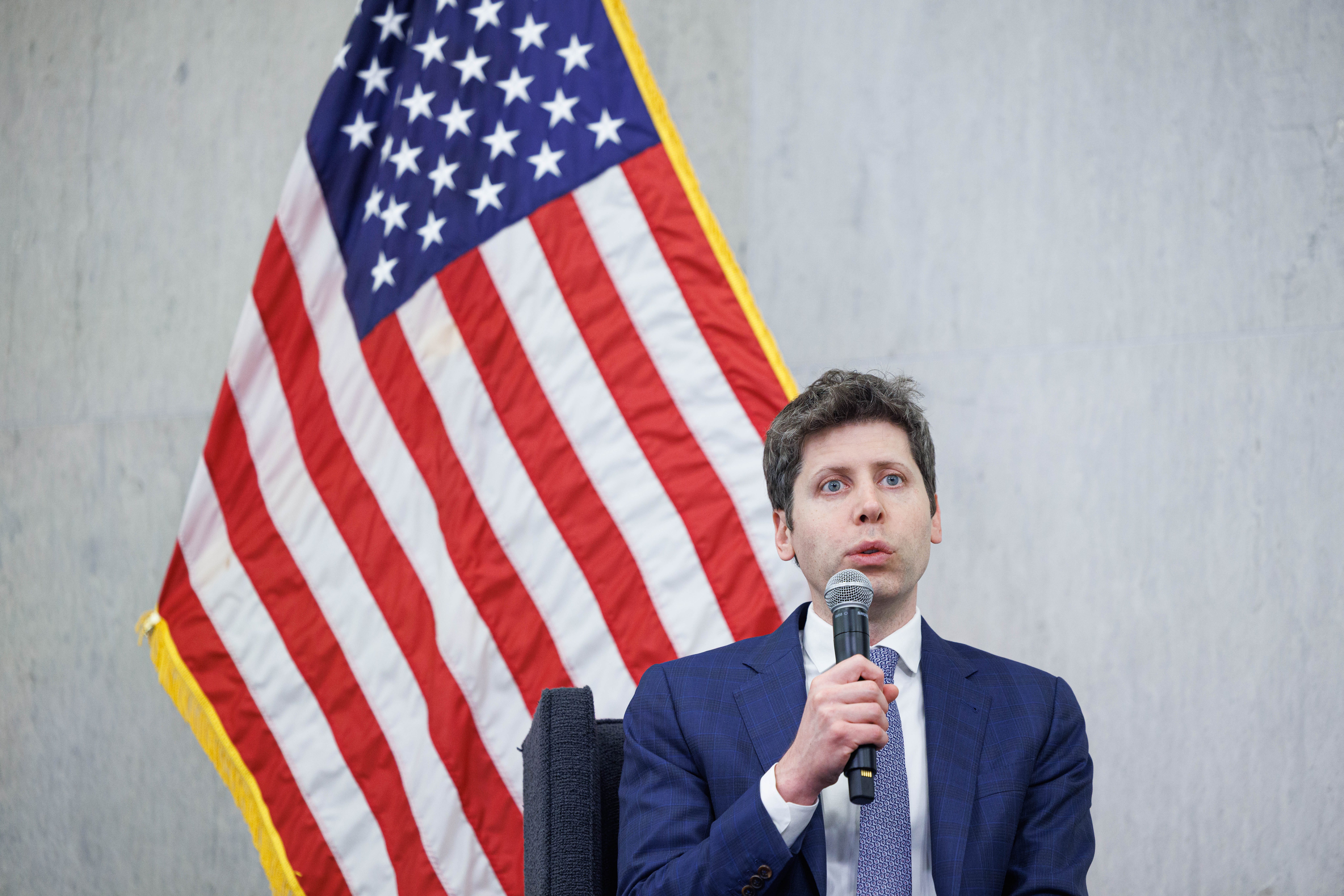 Sam Altman, CEO of OpenAI, gives remarks during a discussion at the Federal Reserve Board of Governors' 